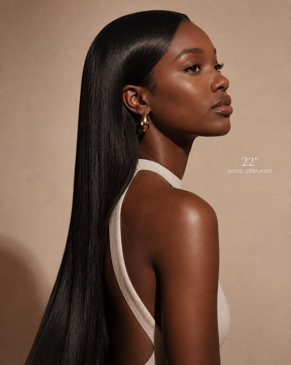 Client in profile wearing long silky straight Kady hair